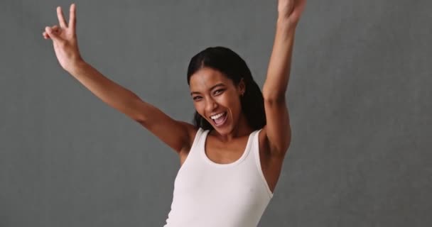 Happy Enthusiastic Mixed Race Female Making Peace Sign Touching Her — Stockvideo