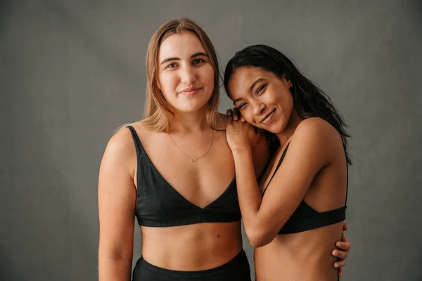 Two Relaxed Content Smiling Girlfriends Posing Studio Workout High Quality — Φωτογραφία Αρχείου