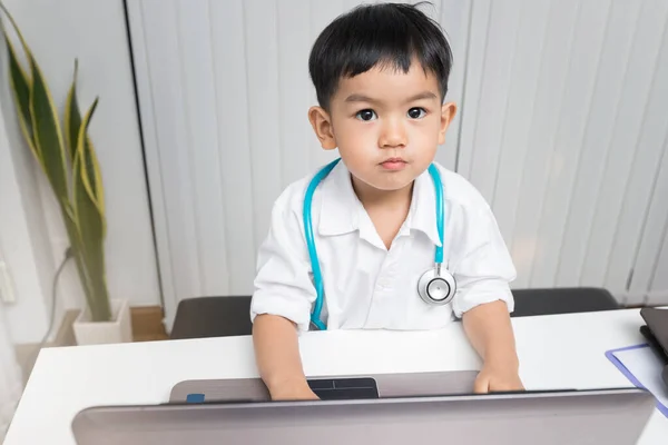 Little Boy Medic Uniform Using Laptop Desk Careers Children Dreams — 스톡 사진