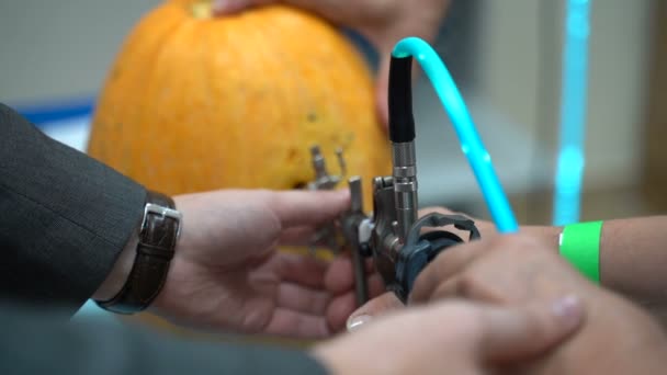 Training Surgeon Students Mannequins Inspect Insides Pumpkin Endoscope — Stock video