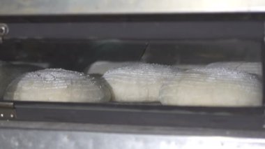 White cheb bake in the oven. Time Laps
