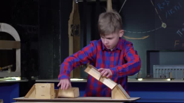 Boy Years Building Bridge Made Wooden Blocks — Stock Video