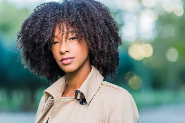 Dominican Republic young student woman headshot. Winter lifestyle afro hair Latin portrait — Stock Photo, Image