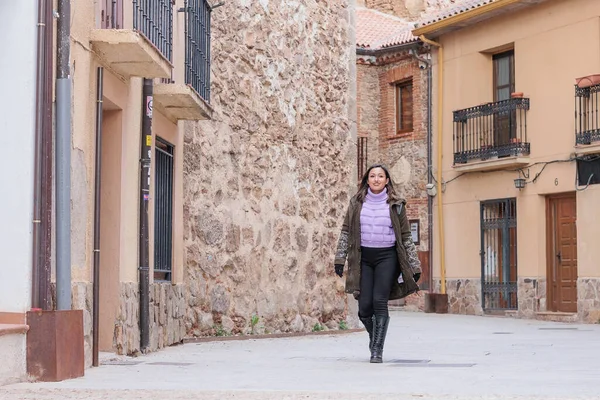 Buitrago de Lozoya local tourism in Madrid. Young Latin honduran woman travel on holiday trip — Stock Photo, Image