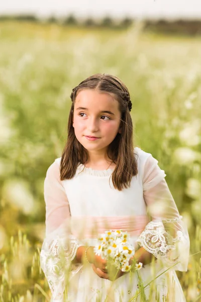 female religious christianity white dress for communion lifestyle portrait. background with copy space