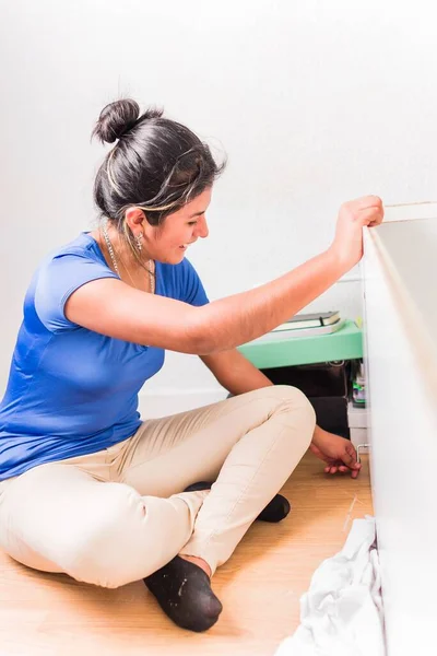 Lifestyle Hispanic Female Repair Decorating Installing New Home Tools Strong Stock Photo