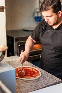 latin america work successful pizza cooking preparation in traditional cuisine