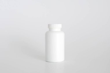 İlaç şişesi. İlaç, diyet ve besin takviyeleri için beyaz tıbbi konteynır. İlaçlar için beyaz plastik kavanoz. Paketleme şablonu. Boş alan, kopyalama alanı.