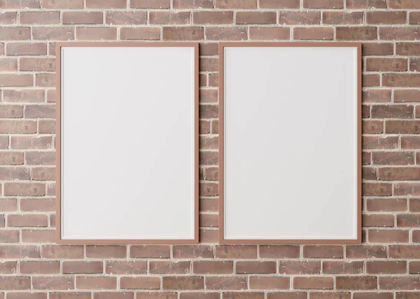 Dos marcos verticales en blanco colgando de la pared de ladrillo marrón. Plantilla, maqueta para tu foto o póster. Copiar espacio. Renderizado 3D. — Foto de Stock