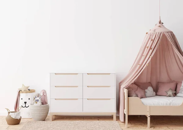 Empty white wall in modern child room. Mock up interior in scandinavian style. Free, copy space for your picture, poster. Bed, console, rattan basket, toys. Cozy room for kids. 3D rendering.
