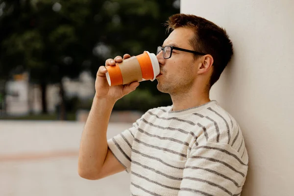 Young Adult Man Sitting Outdoors Drinking Coffee Enjoying Good Weather — Stock Photo, Image