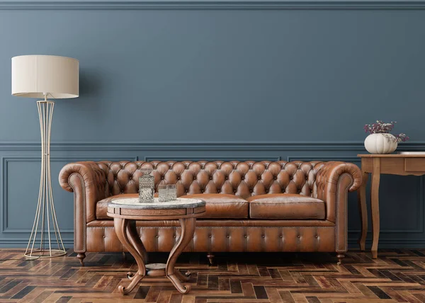 Empty blue wall in modern living room. Mock up interior in classic style. Copy space for your picture, poster. Template for artwork. Brown leather sofa, parquet floor, wall molding. 3D rendering