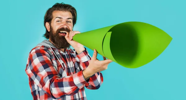 Smiling man with paper loudspeaker. Bearded male with megaphone. Advertising concept. Season sale. — ストック写真