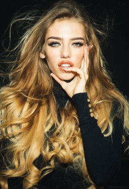 Sensual model girl with healthy hair, perfect makeup, thick eyelashes. Cosmetics, skincare, haircare