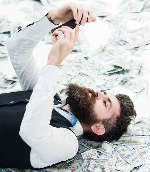 Businessman Bearded Man Phone Lying Banknotes Finance Business Success Online — Stok fotoğraf