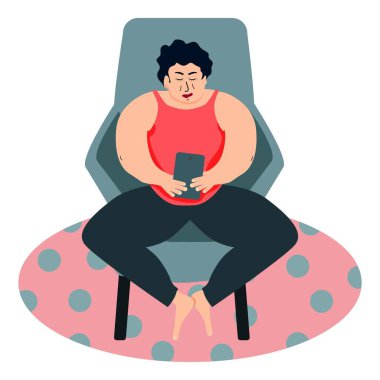 Şişman bir adam sandalyede oturur ve telefon tabletine bakar. İyi beslenmiş bir adam boş vaktini evde geçirir. Evinize bir bakın.