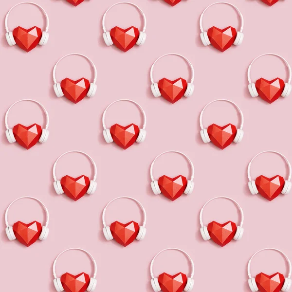 Płynny wzór z czerwonym wielokątnym papierem w kształcie serca w białych słuchawkach. Koncepcja muzyki. Zestaw słuchawkowy DJ. — Zdjęcie stockowe