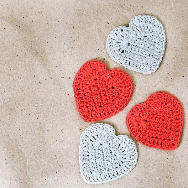 Four Knitted Heart Lying Wrapping Paper Colorful Hearts Background Valentine — Stock Photo, Image