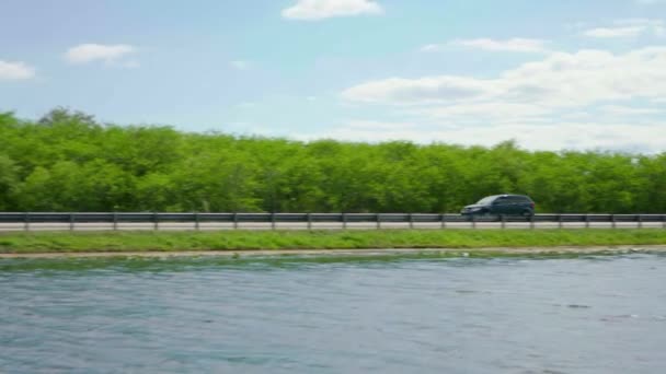 Road Trip Minivan Driving Lane Highway Canal Blue Skies Green — Stock Video