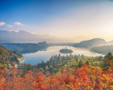 Fabulous sunrise over popular tourist destination  Bled lake. Dramatic view of Pilgrimage Church of the Assumption of Maria. Location: Bled, Upper Carniolan region, Slovenia, Europe