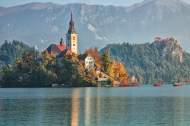 Fabulous sunny day view of popular tourist destination  Bled lake. Dramatic view of Pilgrimage Church of the Assumption of Maria. Location: Bled, Upper Carniolan region, Slovenia, Europe
