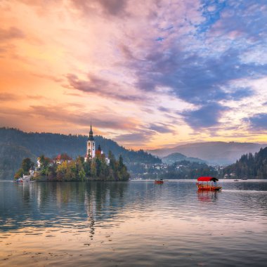 Astonishing sunset view of popular tourist destination  Bled lake. Dramatic view of Pilgrimage Church of the Assumption of Maria. Location: Bled, Upper Carniolan region, Slovenia, Europe