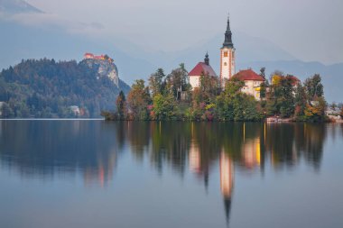 Stunning sunset view of popular tourist destination  Bled lake. Dramatic view of Pilgrimage Church of the Assumption of Maria. Location: Bled, Upper Carniolan region, Slovenia, Europe