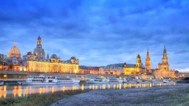 Sunset on Elbe river with panorama of Cathedral of the Holy Trinity or Hofkirche, Bruehl's Terrace or The Balcony of Europe Location: Dresden, state of Saxony, Germany, Europe