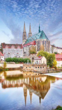 Colorful autumn cityscape of Gorlitz with parish church of St. Peter and Paul.Photographed from the Polish side. Location: Gorlitz, state of Saxony, Germany, Europe