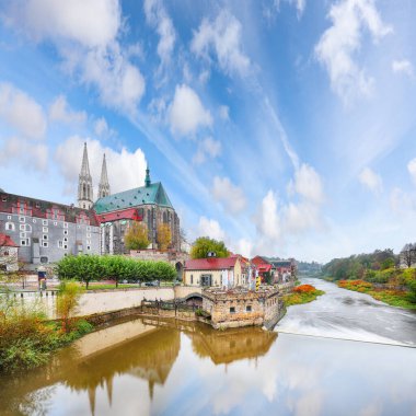 Colorful autumn cityscape of Gorlitz with parish church of St. Peter and Paul.Photographed from the Polish side. Location: Gorlitz, state of Saxony, Germany, Europe