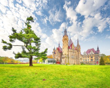 Astonishing autumn landscape with Moszna Castle. Popular tourist destination. Location: Moszna, Opolskie Voivodeship, Poland, Europe