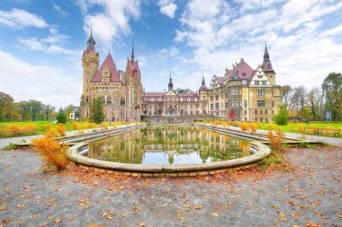 Fabulous autumn landscape with Moszna Castle. Popular tourist destination. Location: Moszna, Opolskie Voivodeship, Poland, Europe