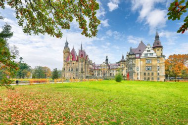 Astonishing autumn landscape with Moszna Castle. Popular tourist destination. Location: Moszna, Opolskie Voivodeship, Poland, Europe