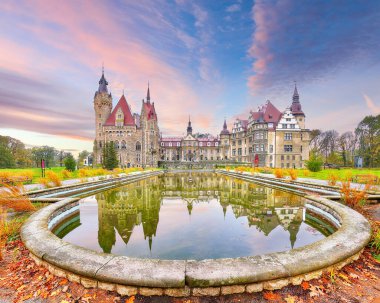 Astonishing autumn landscape with Moszna Castle. Popular tourist destination. Location: Moszna, Opolskie Voivodeship, Poland, Europe