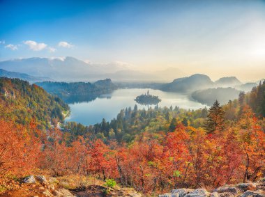 Amazing sunrise over popular tourist destination  Bled lake. Dramatic view of Pilgrimage Church of the Assumption of Maria. Location: Bled, Upper Carniolan region, Slovenia, Europe