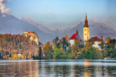 Stunning sunset view of popular tourist destination  Bled lake. Dramatic view of Pilgrimage Church of the Assumption of Maria. Location: Bled, Upper Carniolan region, Slovenia, Europe