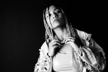 Confident woman wearing braids , Nikita Dev