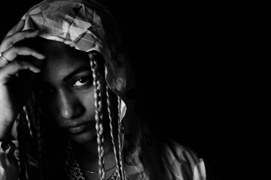 Braided hair woman in hood , Nikita Dev