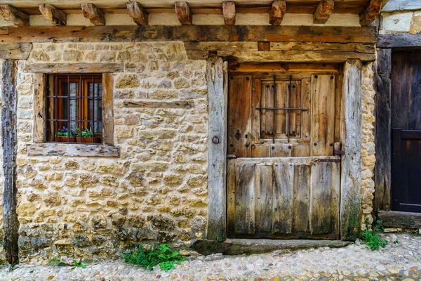 Medieval facade of stone house in Calatanazor, Soria, Spain. — Photo