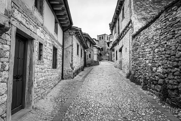 Medieval village alley made of stone, in black and white, Calatanazor, Spain. — Stock Photo, Image