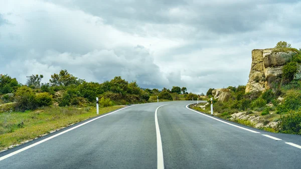 Panorama of mountain road with cloudy storm sky, Guadarrama Madrid. — Stock Photo, Image