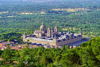 Panoramic view of the impressive monastery of El Escorial, a world heritage site clipart