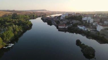 Beautiful aerial views of the Tormes River as it passes through the medieval town of Alba in the province of Salamanca, Spain