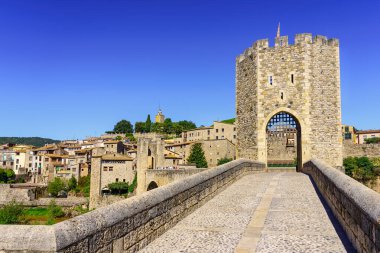 Roman stone bridge over the river in the medieval town of Besalu, Girona, Catalonia