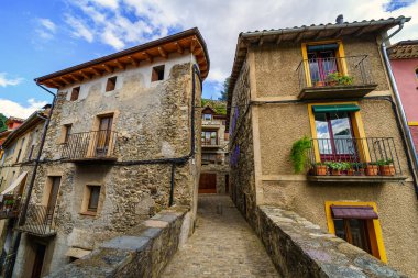 Old construction houses next to the stone bridge of the picturesque town of Camprodon, Pyrenees, Girona