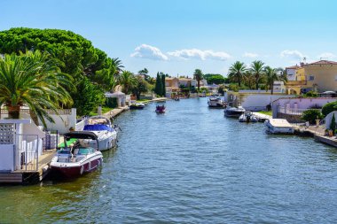 Water channel through which the boats circulate as if they were streets in the coastal urbanization of Ampuriabrava, Girona, Catalonia