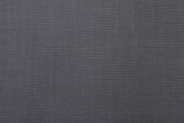 Birbirine dolanan ipliklerle gri kumaş arka plan. Boşluğu Kopyala.