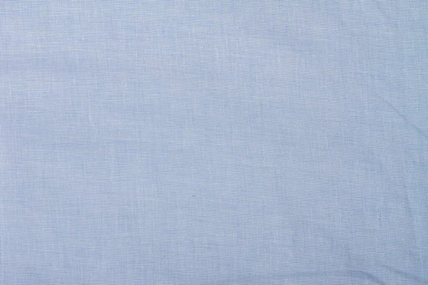 白と青の糸で薄い青の布 — ストック写真