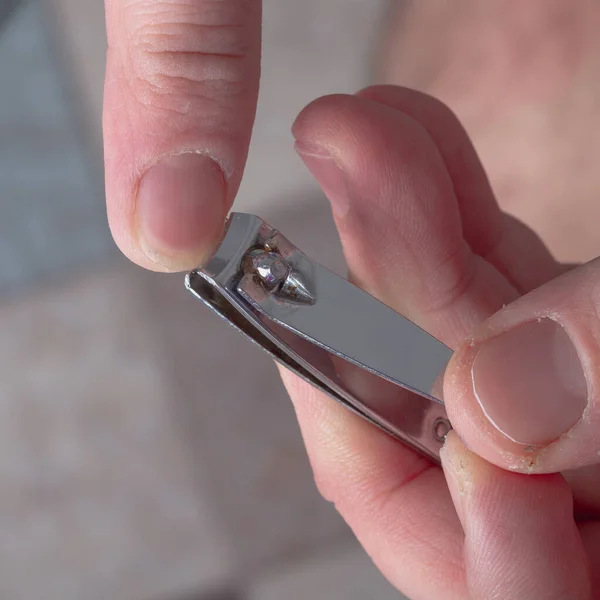 Man Cuts His Fingernails Nail Clippers Man Manicure His Own — Foto Stock