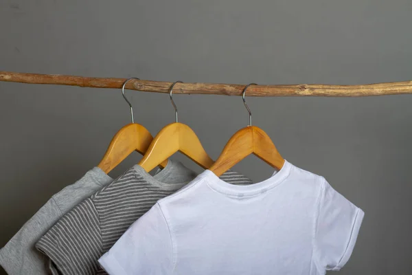 Cotton Clothes Natural Colors Hang Wooden Hanger Gray Background — Stock Photo, Image
